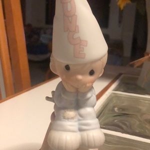 Precious moments pastelLittle boy with dunce cap.
